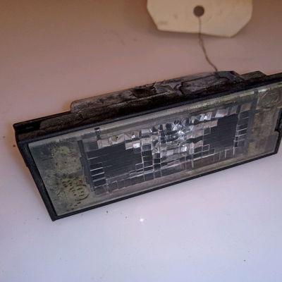 Eclaireur plaque de police g Renault MEGANE III 3-5 portes (BZ0-1_, B3_) 1.5 dci (bz09, bz0d, bz1w, bz29, bz14) (2009) 5 portes