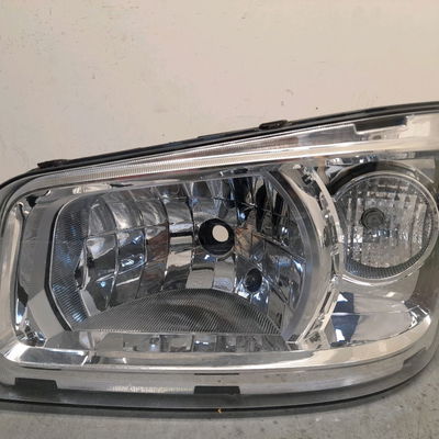 Phare gauche RENAULT MAXITY