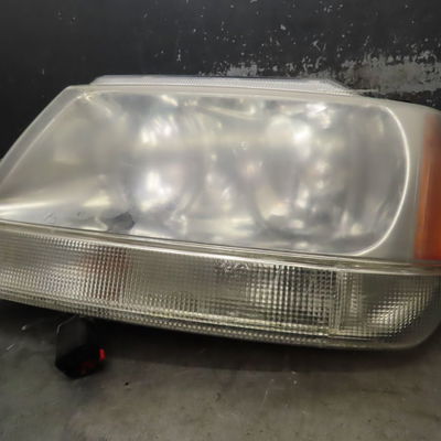 Phare gauche Jeep GRAND CHEROKEE II (WJ, WG) 4.0 4x4 (1999-2005)